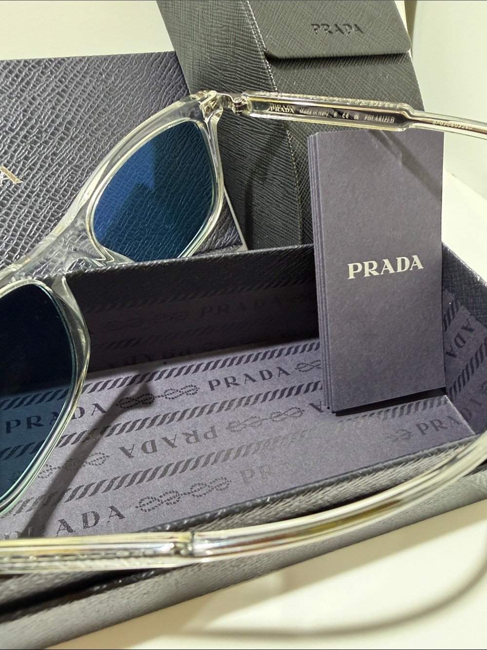 Prada Clear Frame Sunglasses with Blue Lenses - Picture 4 of 5